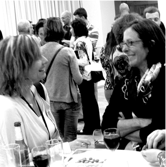 people talking at a past EPIC conference reception